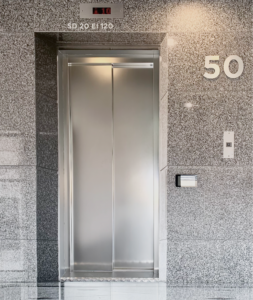 Porte d'ascenseur SLYCMA SD20 EI120 huisserie réduite